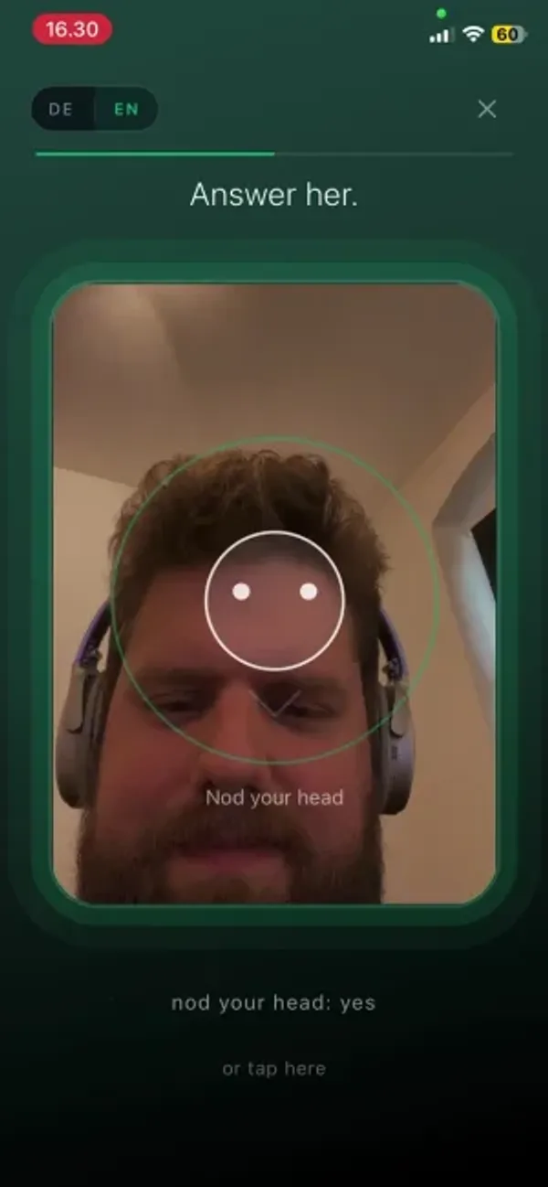 Nodding at the phone camera to answer yes in German